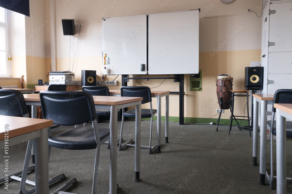 a classroom full of tables and chairs a classroom full of tables and chairs