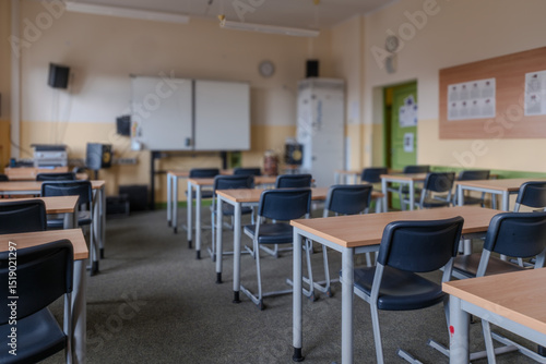 a classroom full of tables and chairs