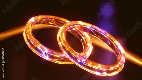 Glowing wedding rings intertwined, symbolizing commitment and love.