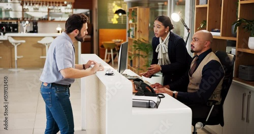 Unhappy, man and complaining to manager, hotel and disappointed with customer service and reception. Motel, receptionist and checking for reservation on computer, discussion or talking to upset guest