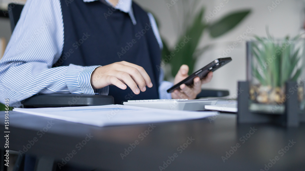 Fototapeta premium Asian woman working at home. Work from home concept