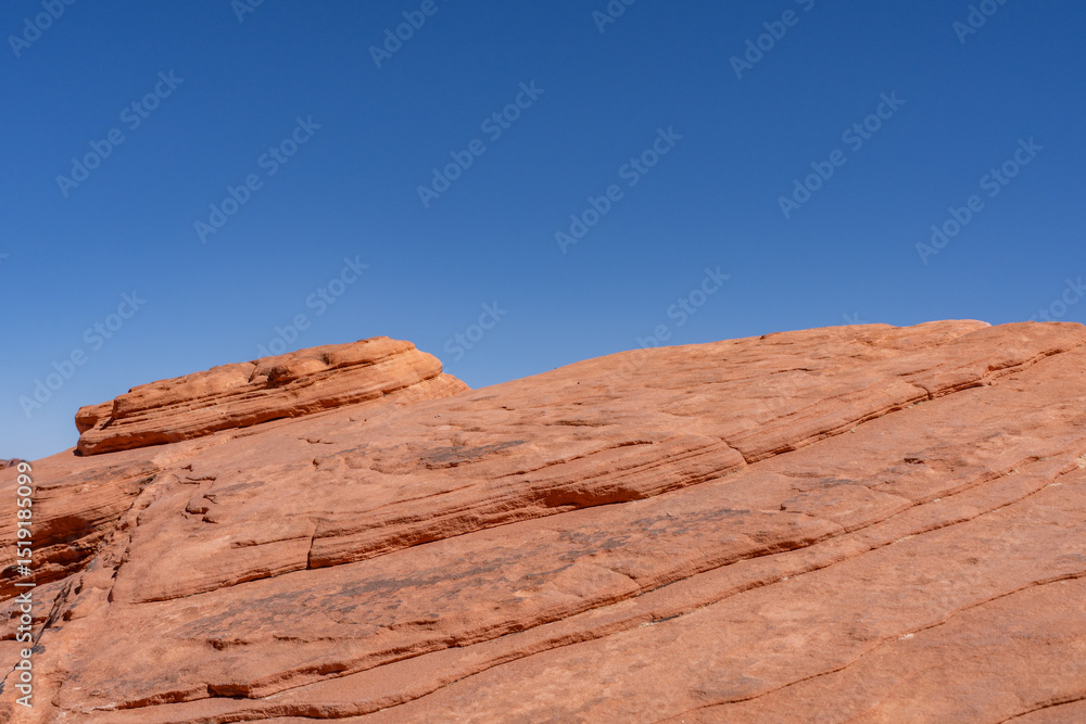 Fototapeta premium Aztec Sandstone, Early Jurassic geological formation of primarily eolian sand . Valley of Fire Road / Highway / State Park, Clark County, Nevada geology. Weathering. Beehive rock formations