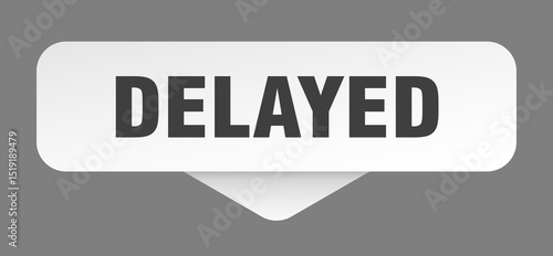 delayed sticker. delayed sign isolated on gray background