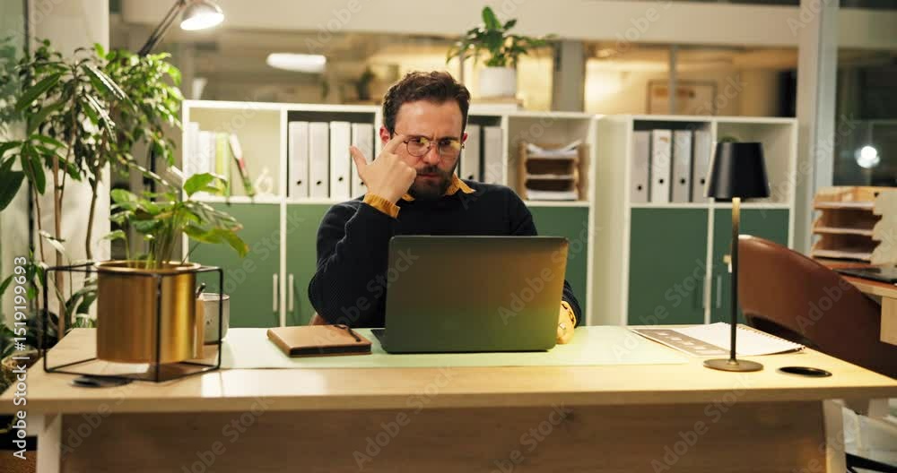Accounting, laptop and thinking with business man in office at night for bookkeeping or tax audit. Computer, finance and problem solving with accountant at desk in workplace for evening deadline Accounting, laptop and thinking with business man in office at night for bookkeeping or tax audit. Computer, finance and problem solving with accountant at desk in workplace for evening deadline