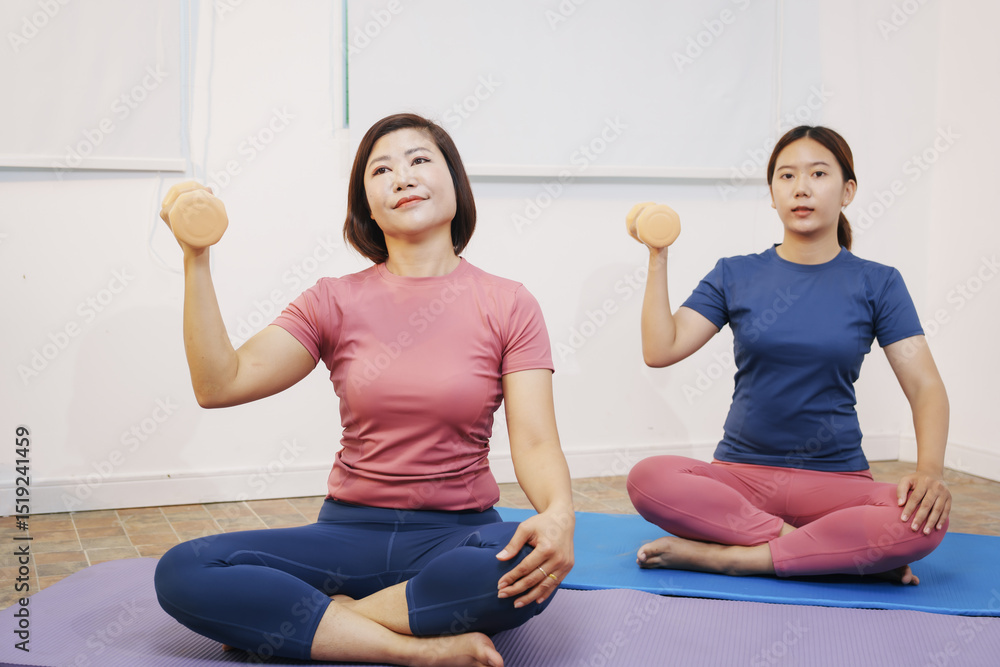 Fototapeta premium yoga, woman, fitness, exercise, gym, people, workout, sport, lifestyle, health, stretching, exercising, pilates, relaxation, meditation, body, sitting, person, healthy, mat, beauty, wellness, stretch,