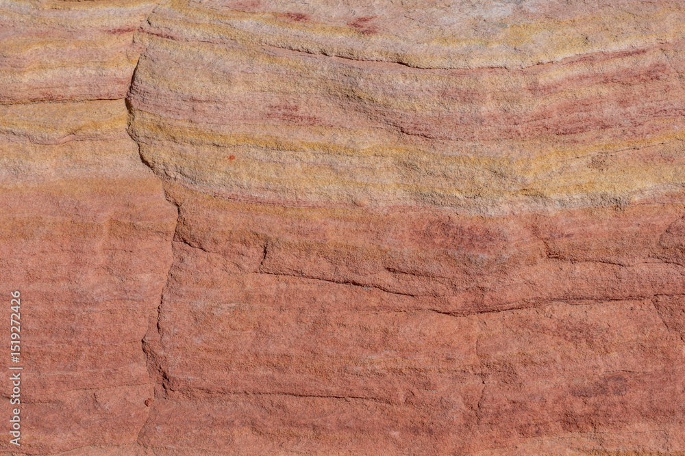Fototapeta premium Fire Wave Trail, red Aztec Sandstone outcrops, Early Jurassic geological formation of primarily eolian sand. Valley of Fire State Park, Clark County, Nevada geology. Weathering. 