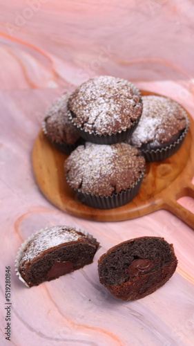 Billede på lærred Chocolate Smurf Bread sprinkled with powdered sugar and chocolate paste inside