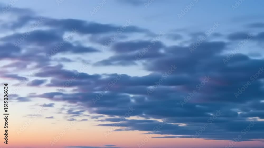 Serene sunset sky with vibrant pink and purple clouds reflecting over a tranquil horizon Serene sunset sky with vibrant pink and purple clouds reflecting over a tranquil horizon