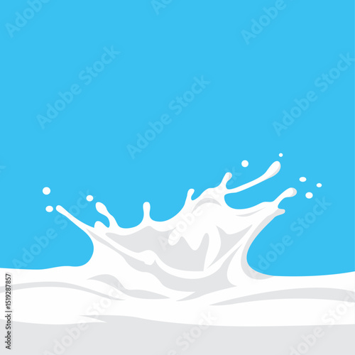 A dynamic splash of white milk against a bright blue background.
