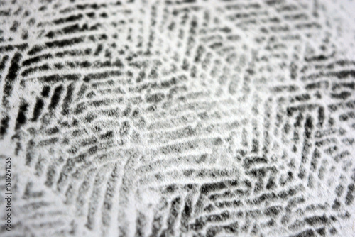 Unusual drawing on clean white paper with interesting black texture made by laser printer. Graphics, unusual drawing, texture, symbols, hooks, squares.
