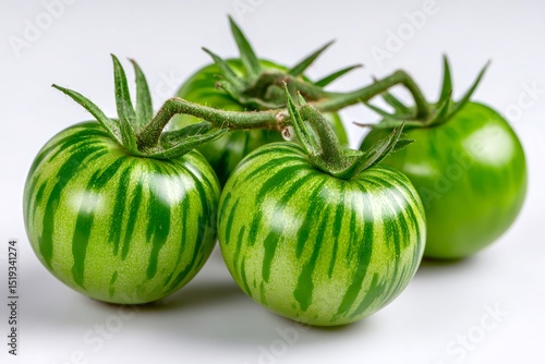 Wallpaper Mural Green zebra tomatoes showing stripes and stems on white background Torontodigital.ca