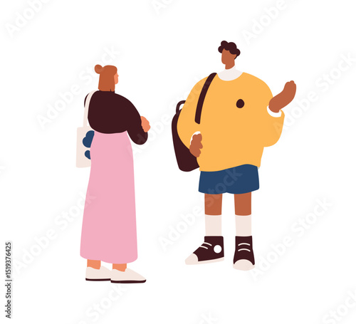 Man and woman talking outdoors. Modern young male and female friends standing...