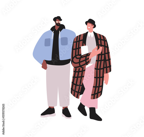 Man and woman in modern style outfits, walking outdoors. Young male and femal...