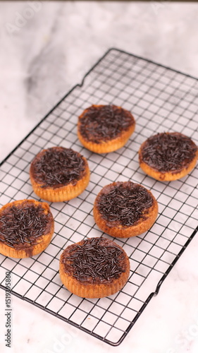 Photography Chocolate bagel cake with sprinkles on top