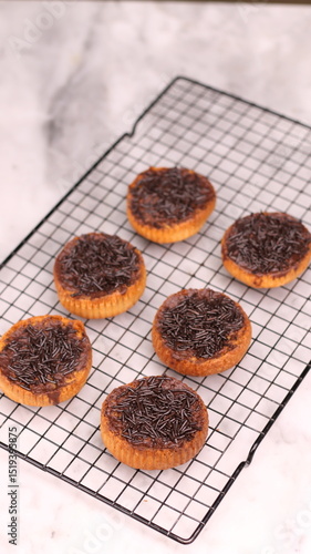 Canvas Print Chocolate bagel cake with sprinkles on top