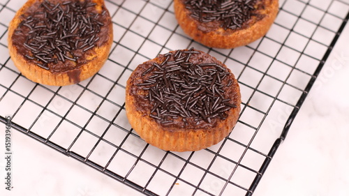 Photography Chocolate bagel cake with sprinkles on top