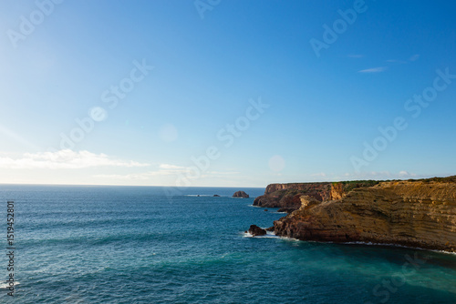 Massive Coastal Rock Formation Rising from Sea near Costa Vicentina, Portugal
