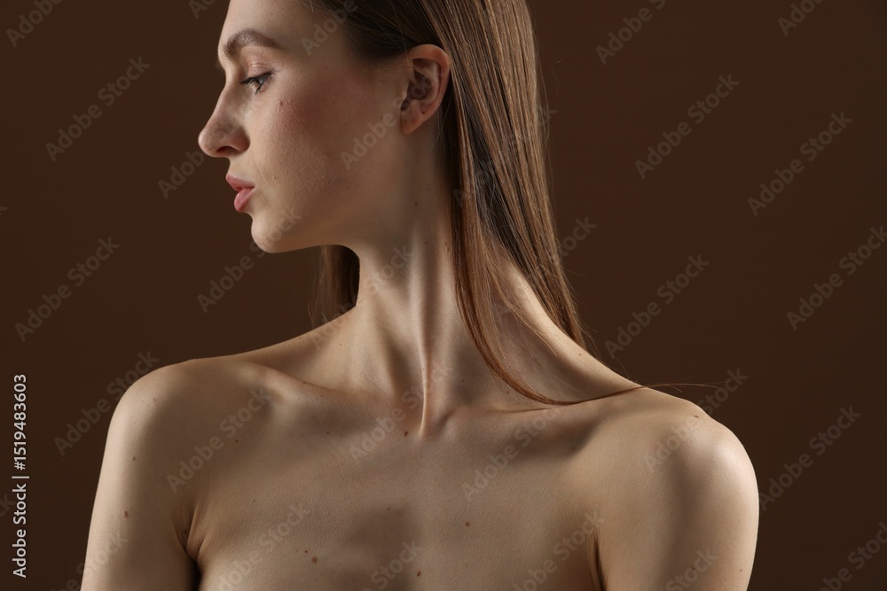 Woman with perfect skin on brown background, closeup Woman with perfect skin on brown background, closeup