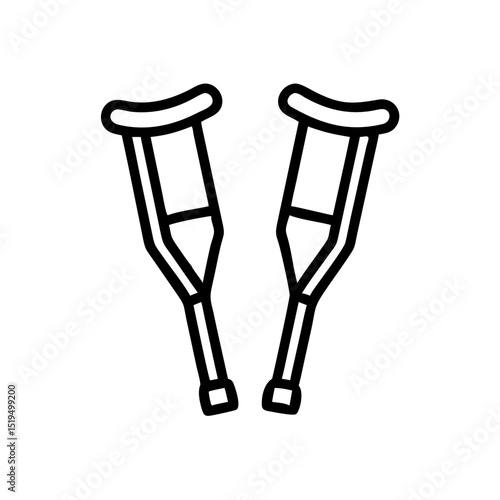 Crutches sit quietly on a plain surface, symbolizing support and mobility assistance during recovery