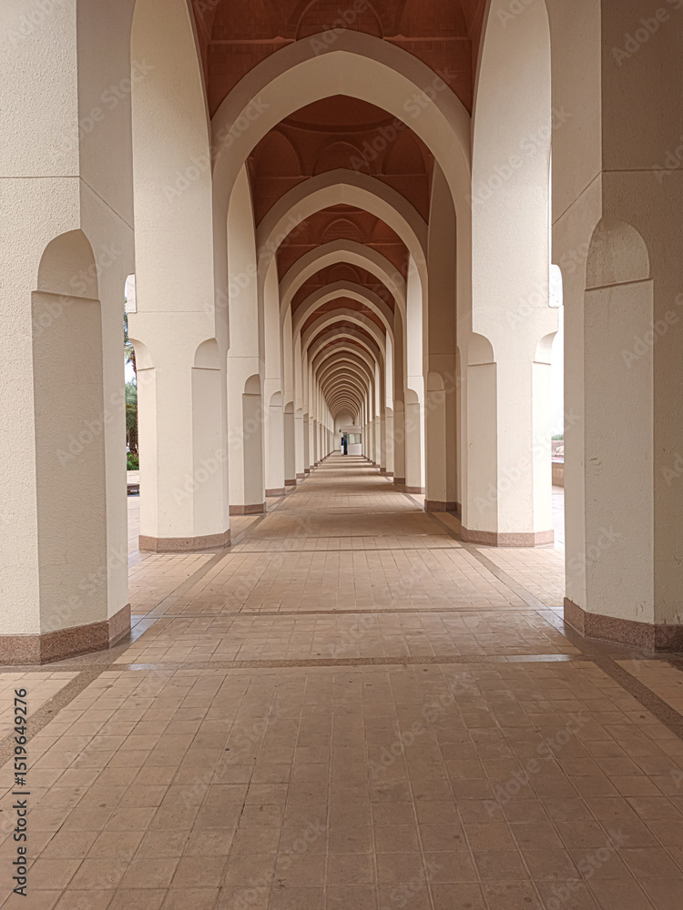 Fototapeta premium Long Corridor of Arches and Pillars at Miqat Dhul Hulaifah Mosque (Masjid Bir Ali)