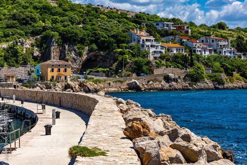 Fototapeta Naklejka Na Ścianę i Meble -  Pier with a lighthouse in Baska on the island of KRK,