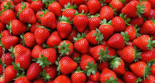 A large pile of fresh, red strawberries stacked together on a white surface, Generative AI.