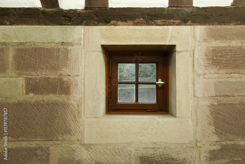Rustic stone walls with small windows