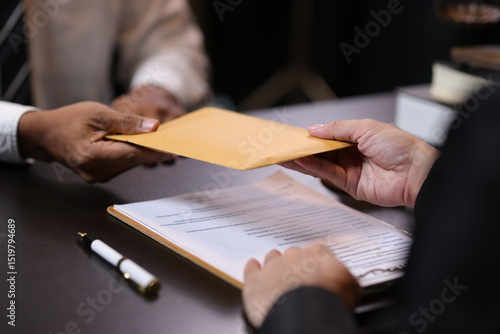 Papier peint Lawyer receiving envelope with money for bribery