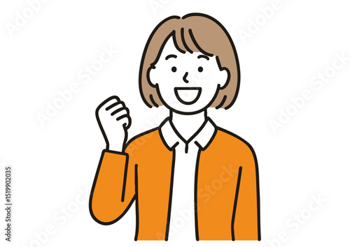 ガッツポーズをする笑顔の若い女性（カジュアル服）