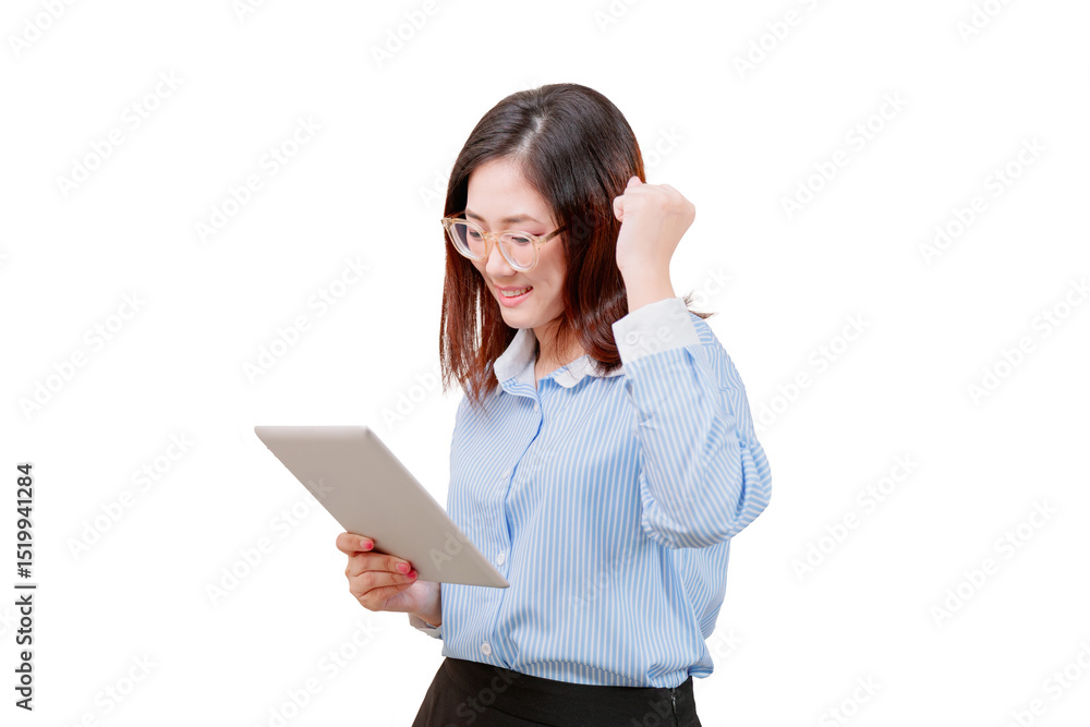 Asian young beautiful woman wearing glasses smiles while looking at a tablet and raising her fist in a gesture of excitement. Asian young beautiful woman wearing glasses smiles while looking at a tablet and raising her fist in a gesture of excitement.