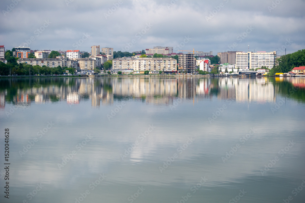 Fototapeta premium view of Ternopil cite reflected in the lake, Ukraine