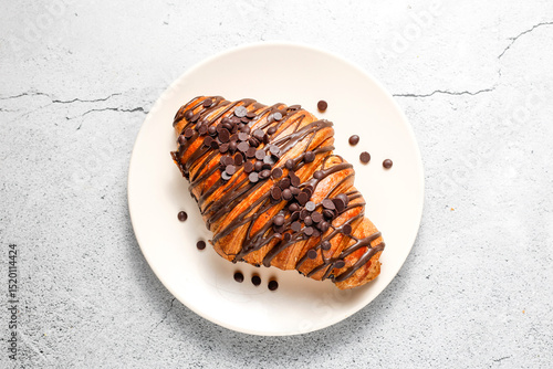 Various new york roll croissants and traditional french croissant with chocolate fillling.