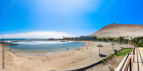 Fototapeta Naklejka Na Ścianę i Meble -  The Laucho beach and boardwalk, Arica, Chile.