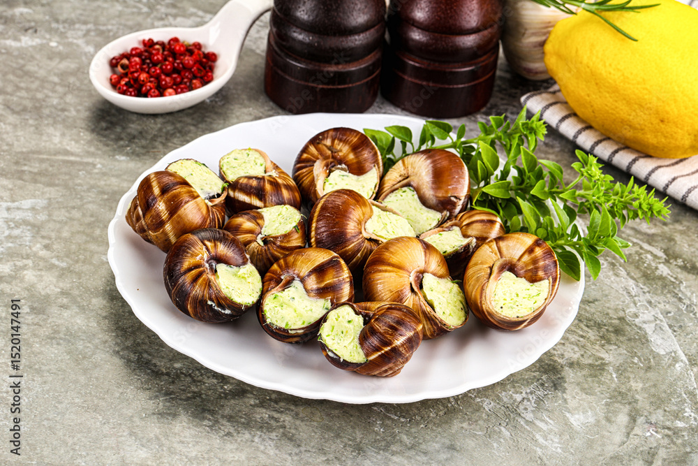 Fototapeta premium Fresnch escargort with basil butter