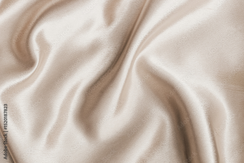 Fototapeta premium Soft satin fabric draped elegantly with gentle folds and a smooth surface