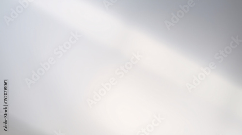 Soft gradient background with a smooth transition of blue and pink tones.