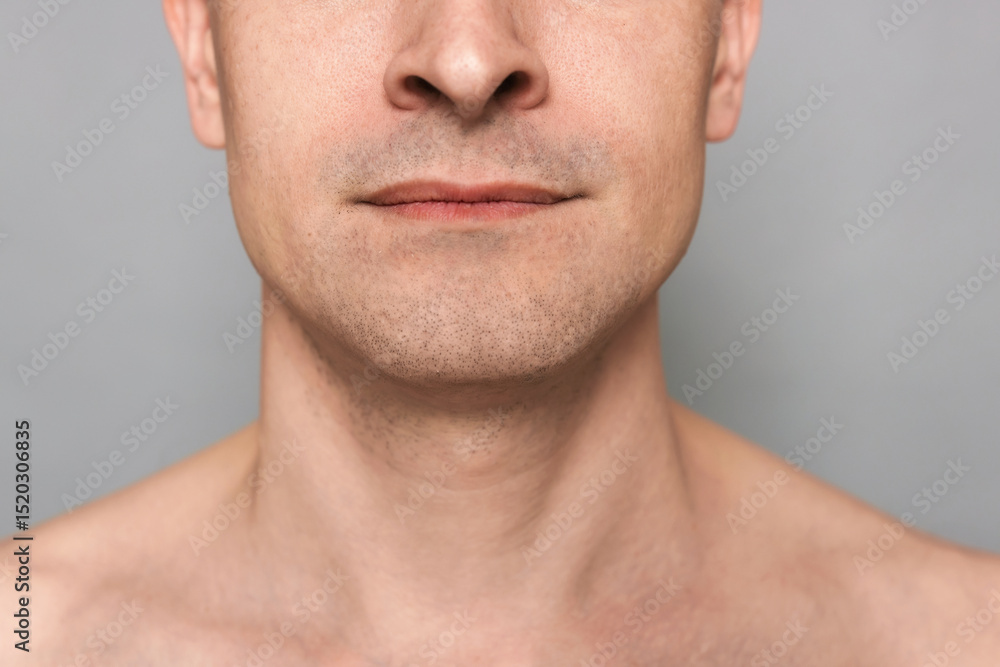 Obraz premium Man after shaving on grey background, closeup