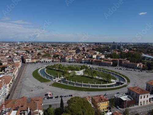 Aerial view of Prato della Valle in Padova, showcasing one of Europe’s largest squares with its iconic elliptical canal and statues.