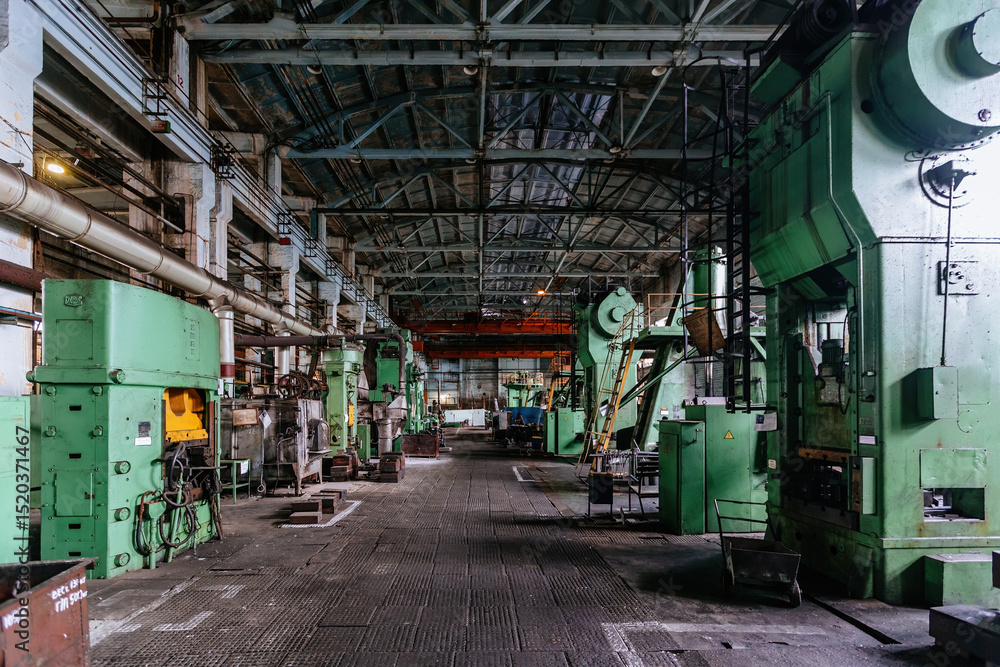 Fototapeta premium Heavy mechanical engineering factory production line. Interior of workshop