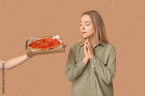 Young woman and hand with t...