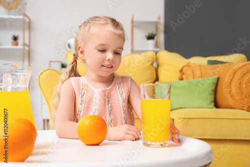 Cute little girl with orang...