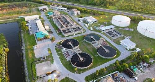 Water treatment facility with multiple tanks and filtration units. Vital infrastructure for sustainable water management and distribution.