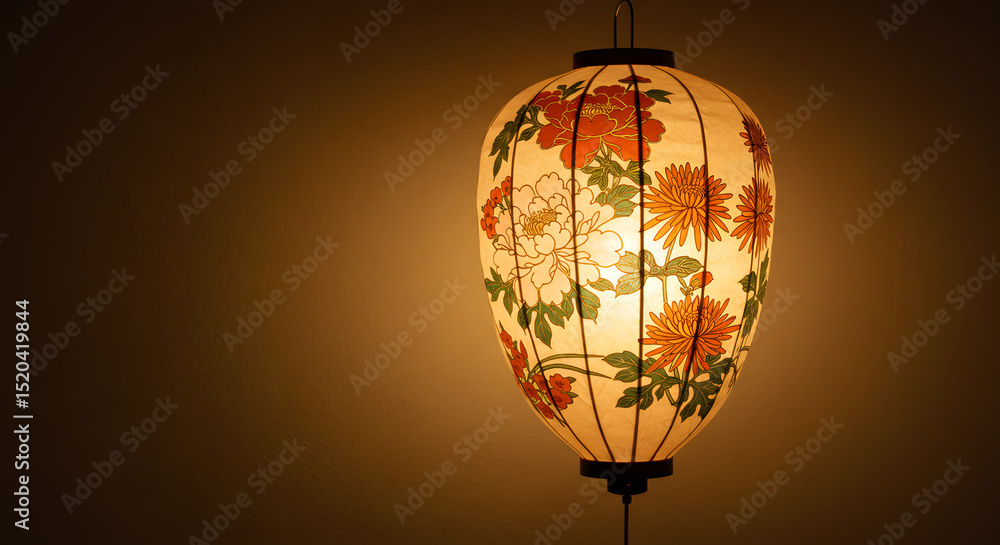 Obraz premium Traditional Chinese Floral Paper Lantern Illuminated with Warm Light on Dark Background