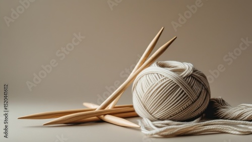 cozy handmade knitting yarn ball and needles close-up