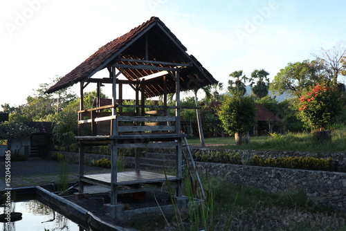 Wallpaper Mural wooden huts in the rice fields in rural Indonesia Torontodigital.ca