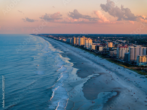 Aerial view of the Jacksonville Beach Pier in north Florida at dusk.
