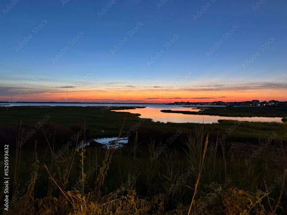 Obraz premium sunset over the river