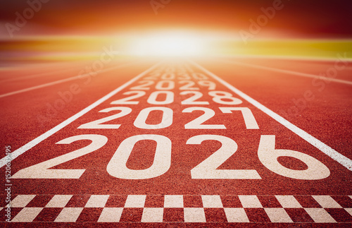 Start of new year. Changes of year 2026, 2027 on Running track. Concept of new ideas starting in new year, planning along with setting objectives to set KPI goals for success in life.
