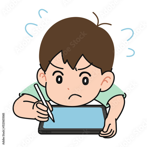 一所懸命に勉強する男の子　タブレット端末