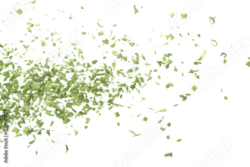Scattered Dried Parsley Flakes on a Black Background for Food Photography and Culinary Applications with Copy Space